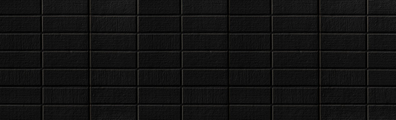 Obraz premium Panorama of Modern black stone tile wall pattern and background