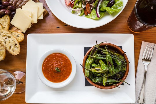 Oven Roasted Padron Peppers and Spicy Tomato Marinara Sauce Appetizer