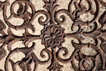 Part of old rusty ornamental metal fence