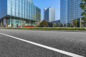 Empty urban road and modern office buildings
