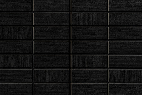 Black stone brick wall pattern and blackground