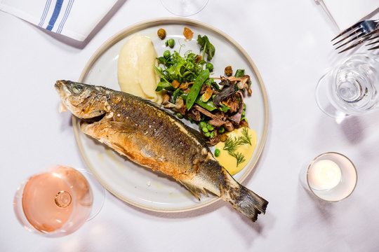 Whole Pan Fried Pacific Rockfish with Potato Puree and Snap Pea and Mushroom Salad
