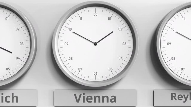 Round clock showing Vienna, Austria time within world time zones. 3D animation