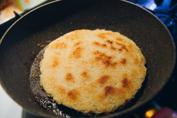 Home cooking Kunefe fried in a pan