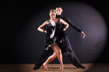 dancers in ballroom isolated on black background