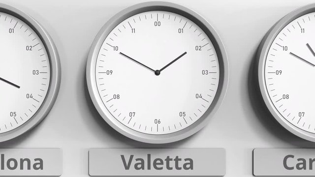 Clock shows Valetta, Malta time among different timezones. 3D animation