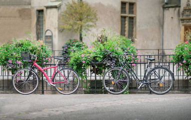 Two bicycles parked on the street of the old city.