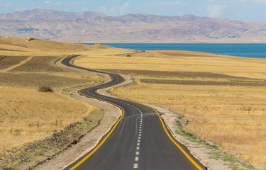Fototapeta na wymiar Van, Turkey - on the high plain between Ararat, Iraq and Iran, an amazing display of nature and colors, and roads that seem to lead to nowhere