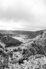 Black and white view of two smaller calderas inside of a larger one on the island of Sao Miguel in...