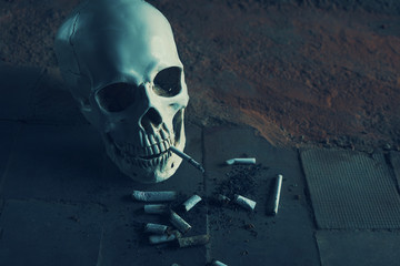Smoking kills concept, portrait of a smoking skull