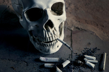 Smoking kills concept, portrait of a smoking skull