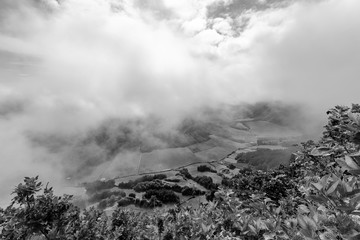 Black and white view of Pastures in the Sete Cidades caldera from the rim in Sao Miguel.