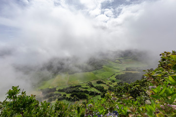 Fototapeta premium Beautiful pastures from the rim of Sete Cidades caldera in Sao Miguel.