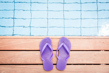 Purple Flip Flops By The Pool