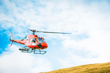 Red Helicopter In The Swiss Alps