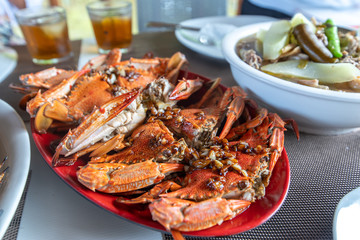 Traditional Filipino Food - Steamed Sea crab with garlic source