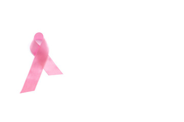 White awareness ribbon on pink background.