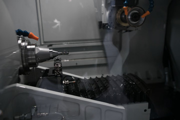 Cutting tool making machine control by CNC program. The CNC carbide cutting tool manufacturing process by grinding machine.