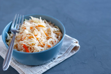 Bowl with sauerkraut standing on table