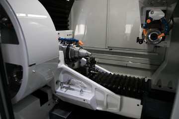 Cutting tool making machine control by CNC program. The CNC carbide cutting tool manufacturing process by grinding machine.