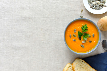 Recipe background concept with pumpkin soup