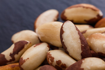 brazil nut on a dark stone background