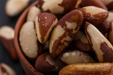 brazil nut on a dark stone background