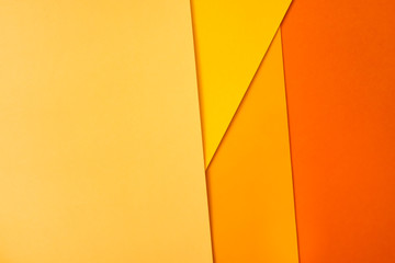 Background of shape and geometry. Colored background decorations with paper. Shades of yellow.