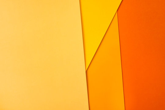 Background of shape and geometry. Colored background decorations with paper. Shades of yellow.