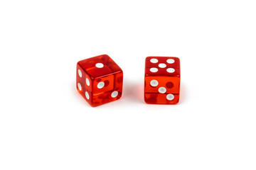 Two red glass dice isolated on white background. One and five.