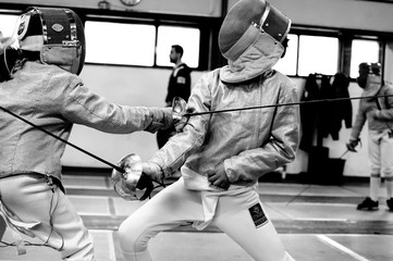 children practicing fence, sabre