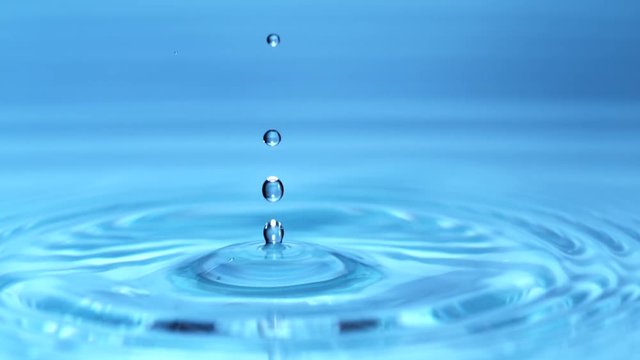 Super slow motion of splashing water drops, filmed on high speed cinema camera