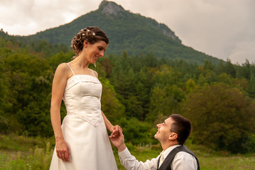 Man asking his fiancee to marry him, marriage proposal