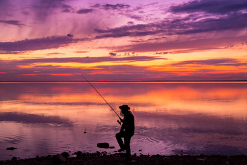 fishing at sunset