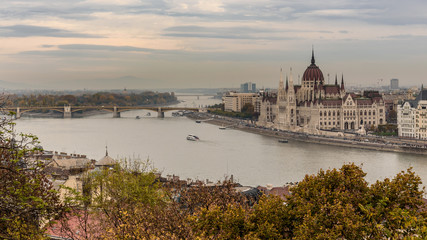 Fototapeta na wymiar Budapest Parliament building, overlooking the river Danube, on a autumn day 