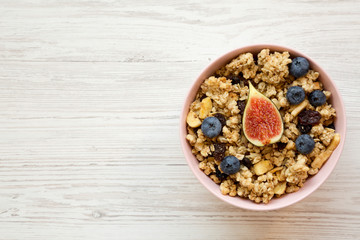 Granola with fruits, top view. Flat lay, from above, overhead. Copy space.