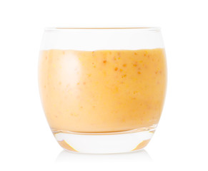 Banana or vanilla smoothie or yogurt in glass