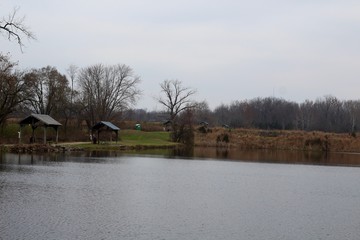 A cloudy day at the lake in the country landscape.