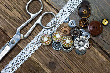 vintage buttons, lace, and a dressmaker scissors