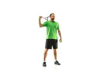 The one caucasian man playing tennis isolated on white background. Studio shot of fit young player at studio in motion or movement during sport game..
