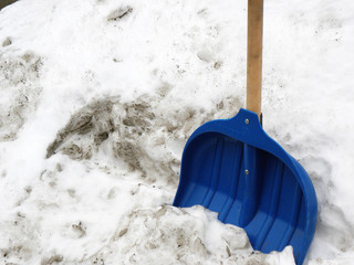 snowdrift and snow shovel