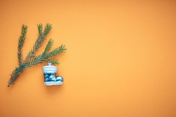 branch Christmas tree on a colored background, a place for text