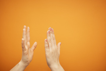 understanding and agreement, a handshake on an orange background