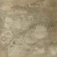 Yellow watercolor texture with abstract washes and brush strokes on the white paper background.
