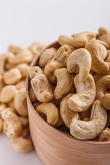 cashew nuts on a white acrylic background