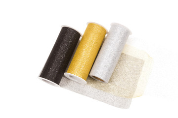 Mesh tulle in rolls on white background.