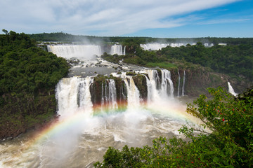 Fototapeta premium Cascade of Iguazu Falls, One of the New Seven Wonders of Nature, in Brazil and Argentina