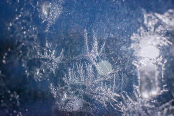 ice on glass at night in winter