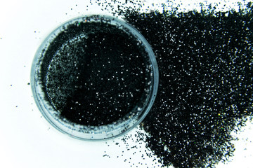 black glitter in a jar.