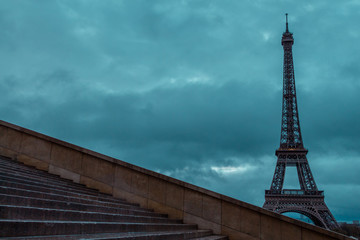 Fototapeta na wymiar Eiffel Tower in the morning against a cloudy sky in winter